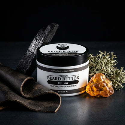 Jar of beard butter with natural elements on a dark background